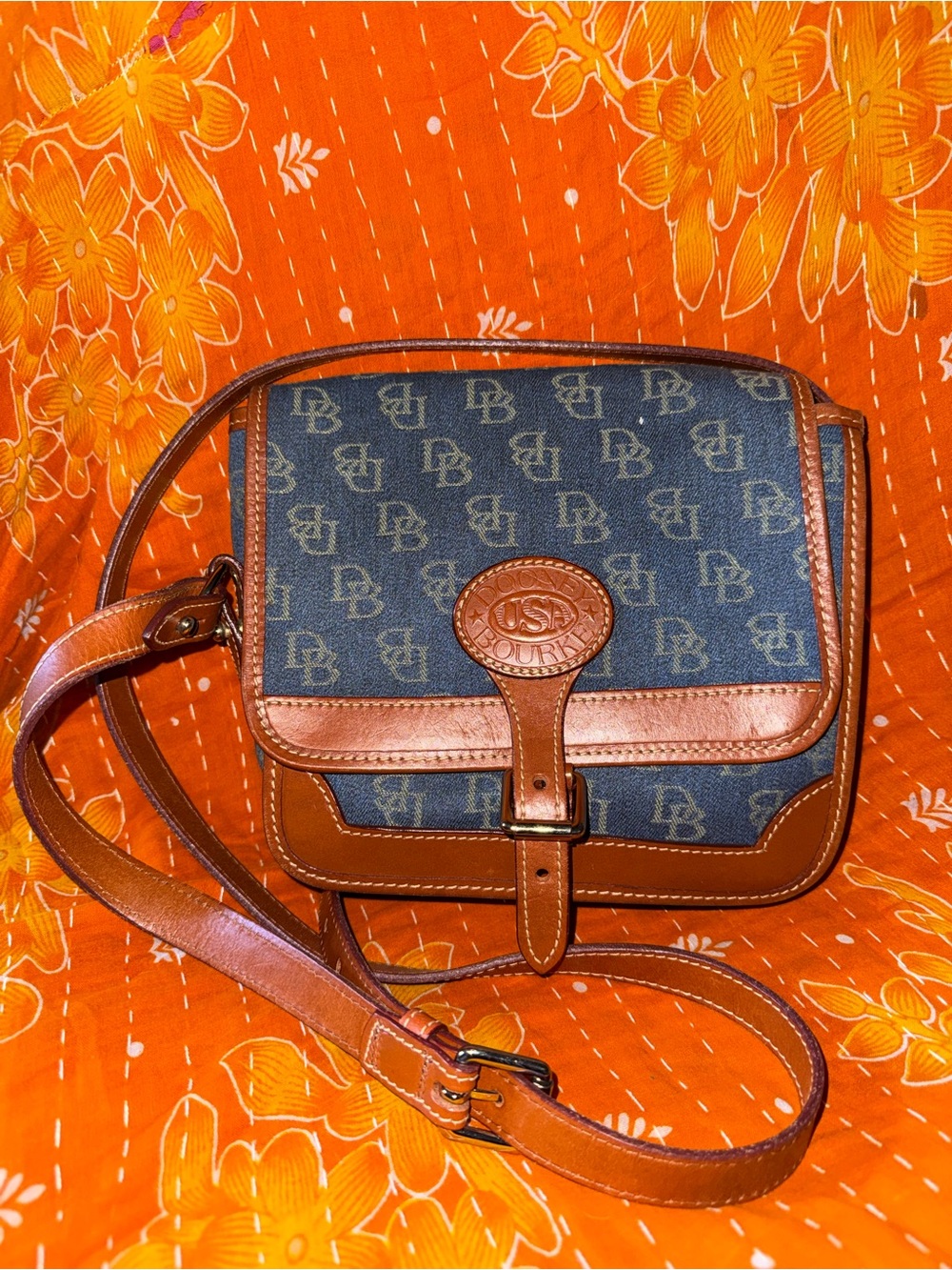 Dooney & Bourke Blue Canvas with Brown Leather Crossbody Saddle Bag